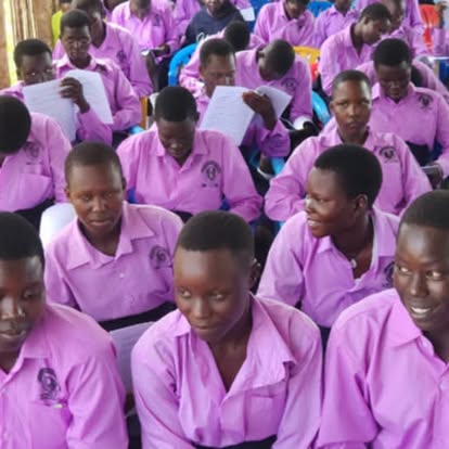 Students studying in pink uniforms